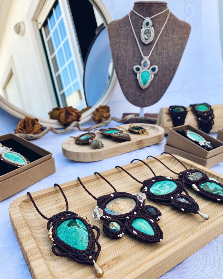 Greenish Valentine collection display, showing all the handmade macrame jewelry pieces available