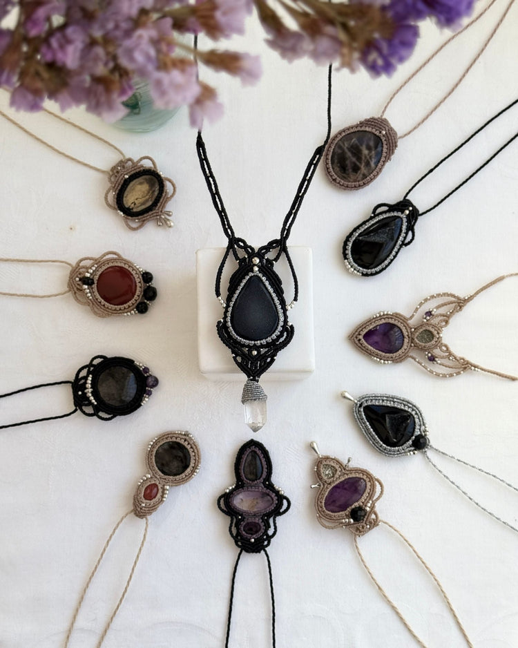 Nocturne collection display, showing all the handmade macrame jewelry pieces available.