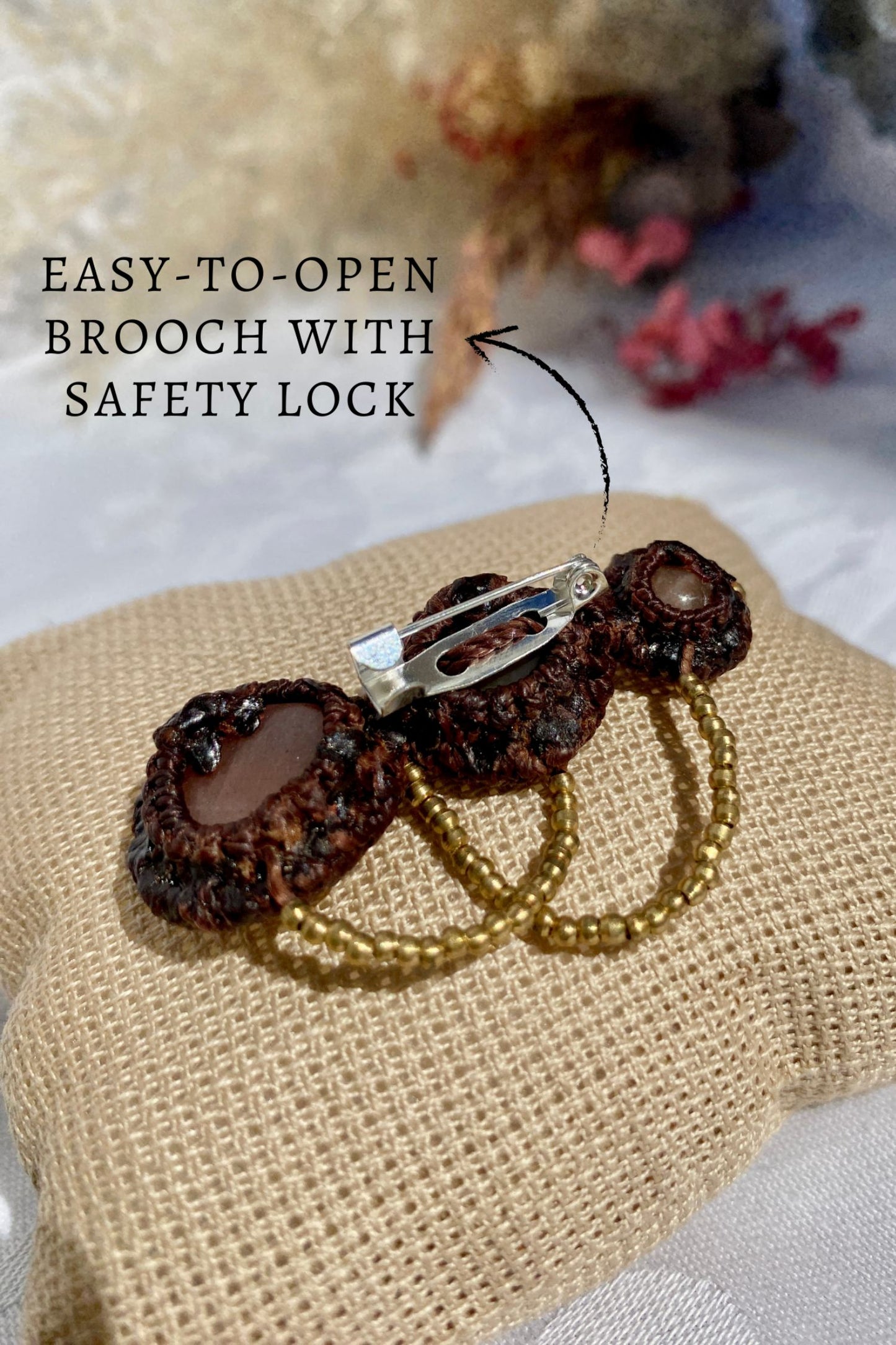 Close-up of the brooch’s easy-to-open safety lock closure, designed for secure and comfortable wear.
