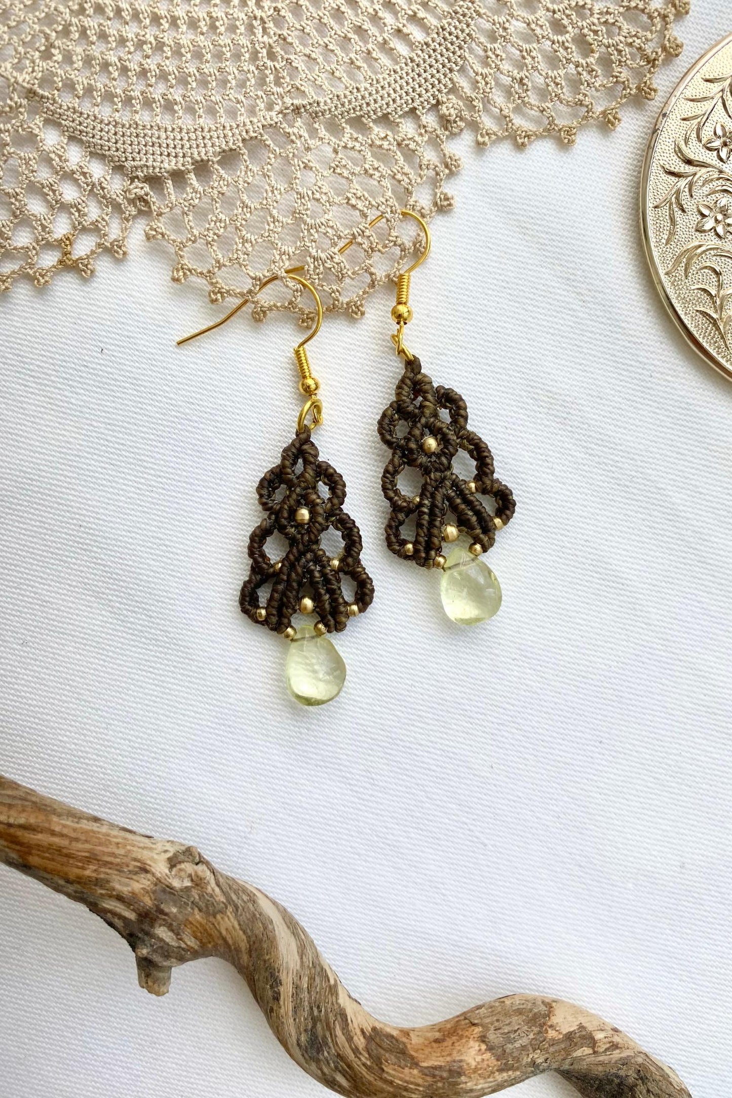 Handmade earrings featuring Lemon Quartz gemstones, designed with a unique and lightweight structure. Crafted with stainless steel hooks for durability and comfort.