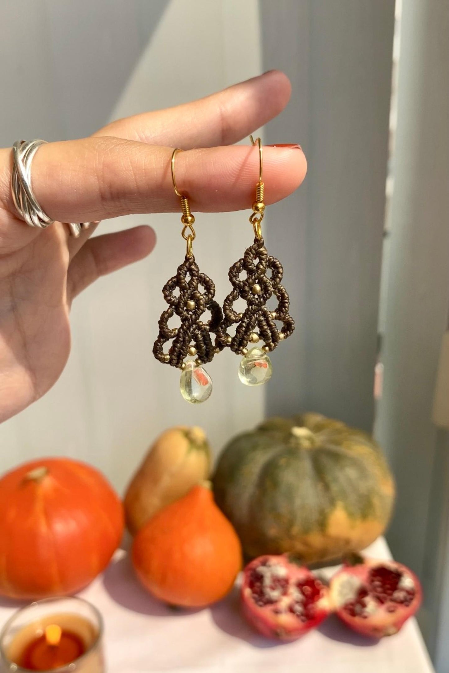 Up view of the handmade earrings, displaying the high-quality stainless steel hooks for secure and comfortable wear.