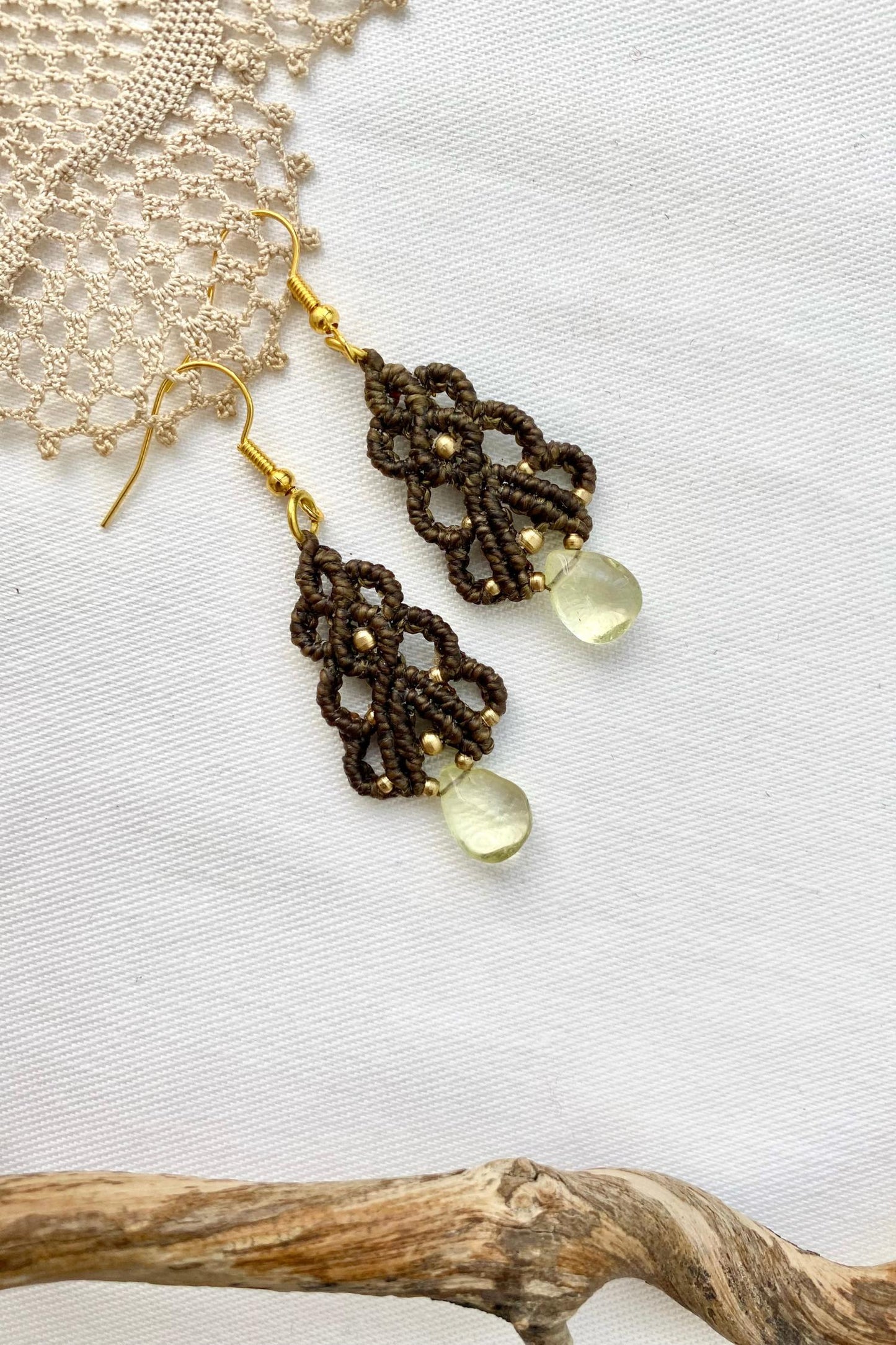 Detailed close-up of the natural Lemon Quartz gemstones, capturing their natural clarity and light-reflecting beauty.