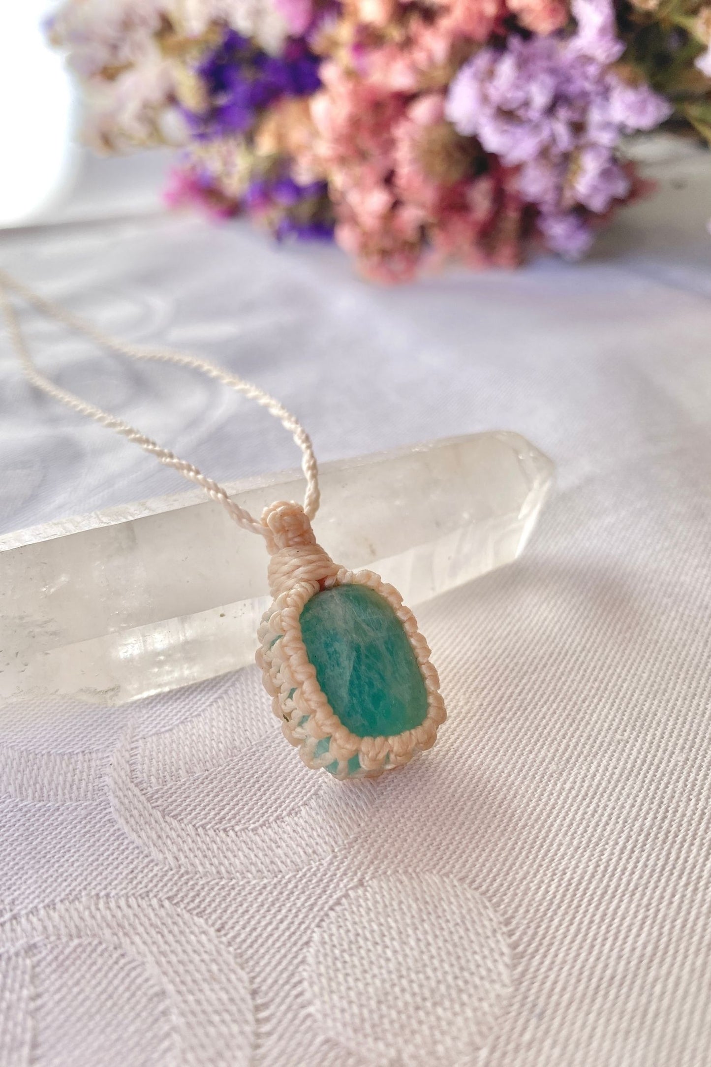 Side angle shot of the handmade Amazonite Macrame necklace, emphasizing the elegant craftsmanship and natural gemstone colors.