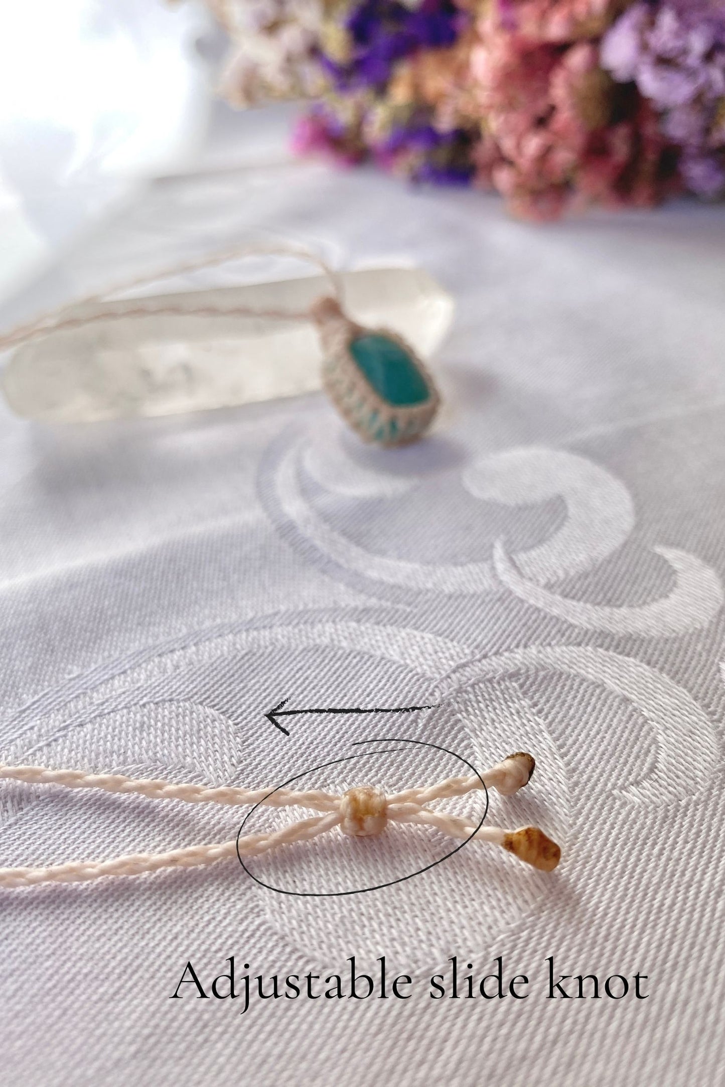 Close-up of the adjustable sliding knot on the Amazonite Macrame necklace, allowing for an easy and customizable fit for any wearer.