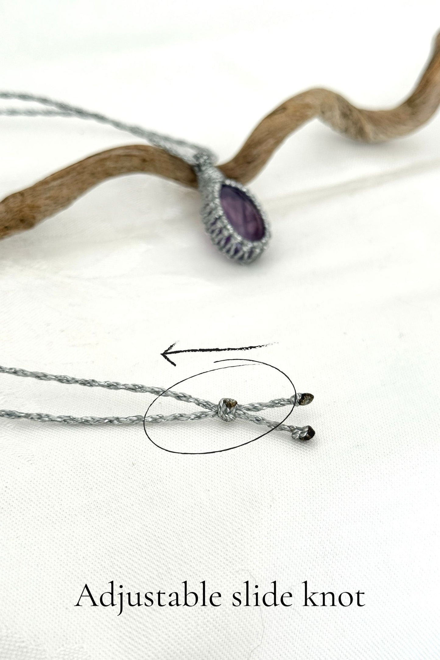 Close-up of the adjustable sliding knot on the Amethyst Macrame necklace, allowing for an easy and customizable fit for any wearer.