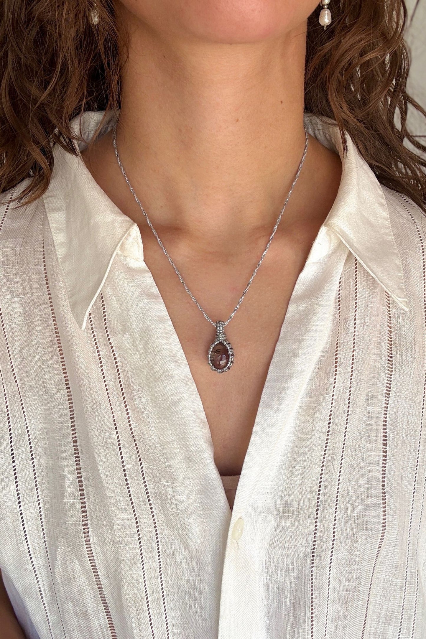 Model wearing a delicate handmade Smoky Quartz macrame necklace with a silver cord, perfect for everyday wear.