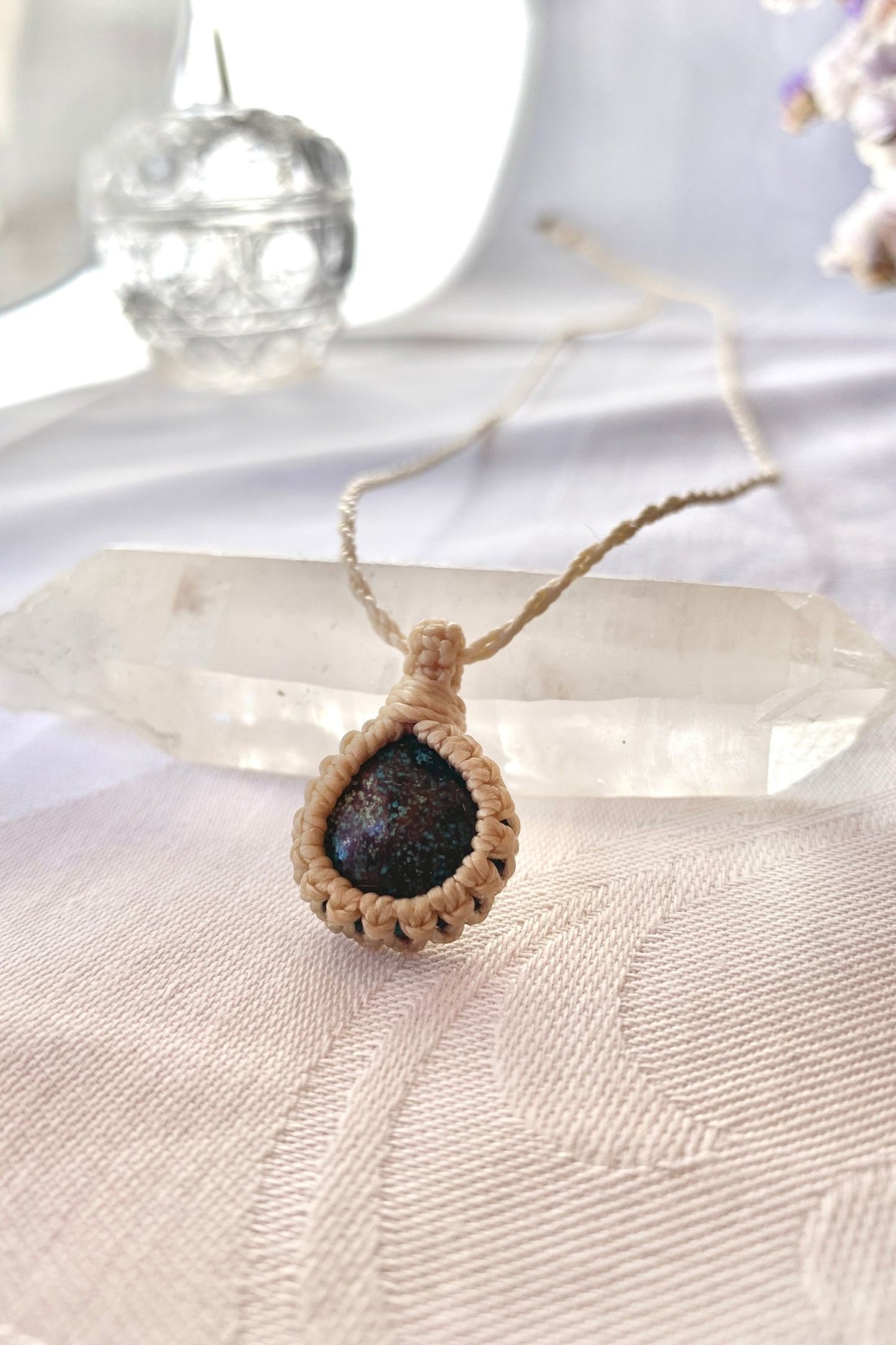 Another side angle shot of the handmade Turquoise Macrame necklace, emphasizing the elegant craftsmanship and natural gemstone colors.