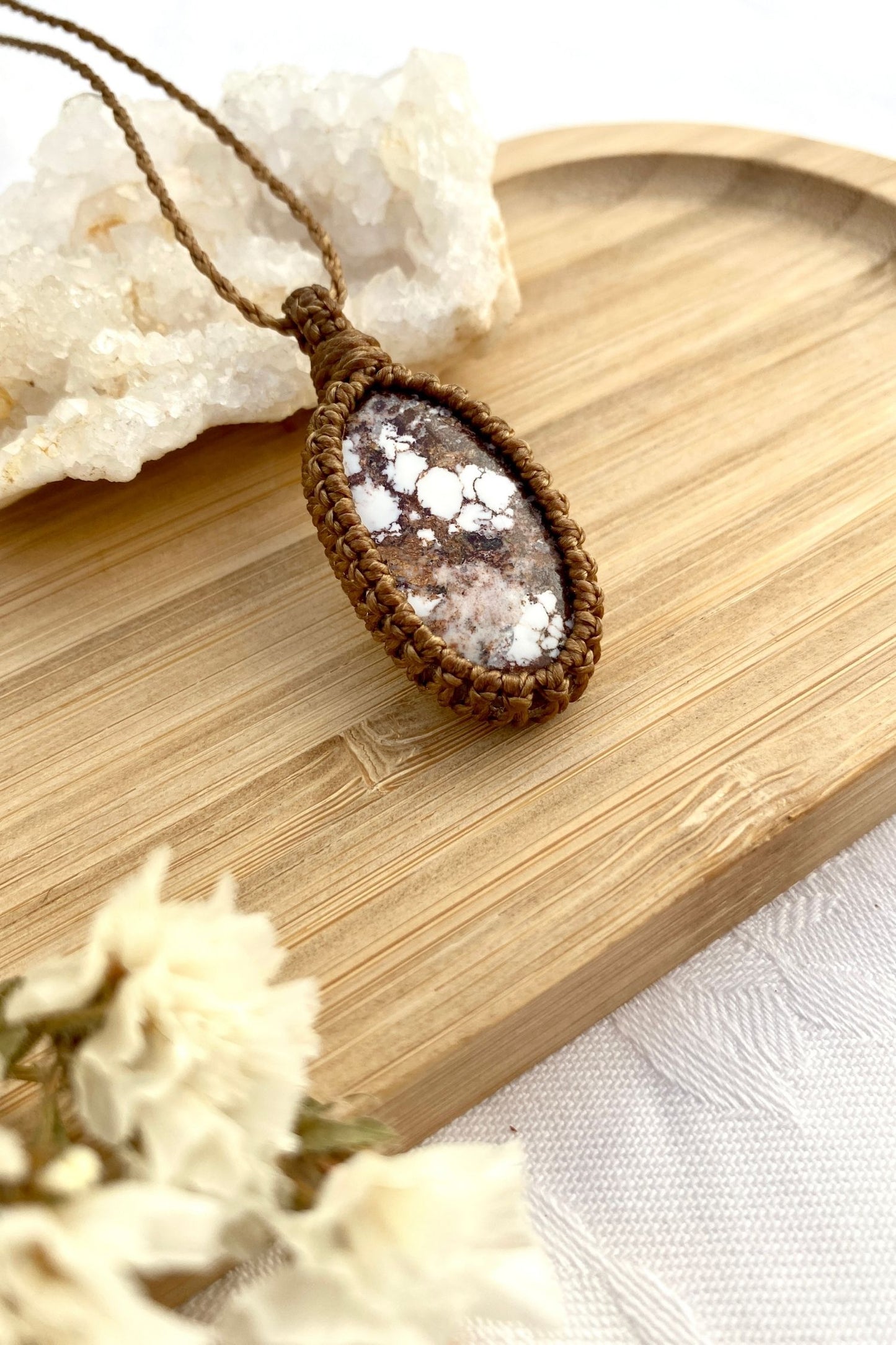 Another side angle view of the Wild Horse Magnesite macrame necklace, capturing its organic texture and rich earthy hues.