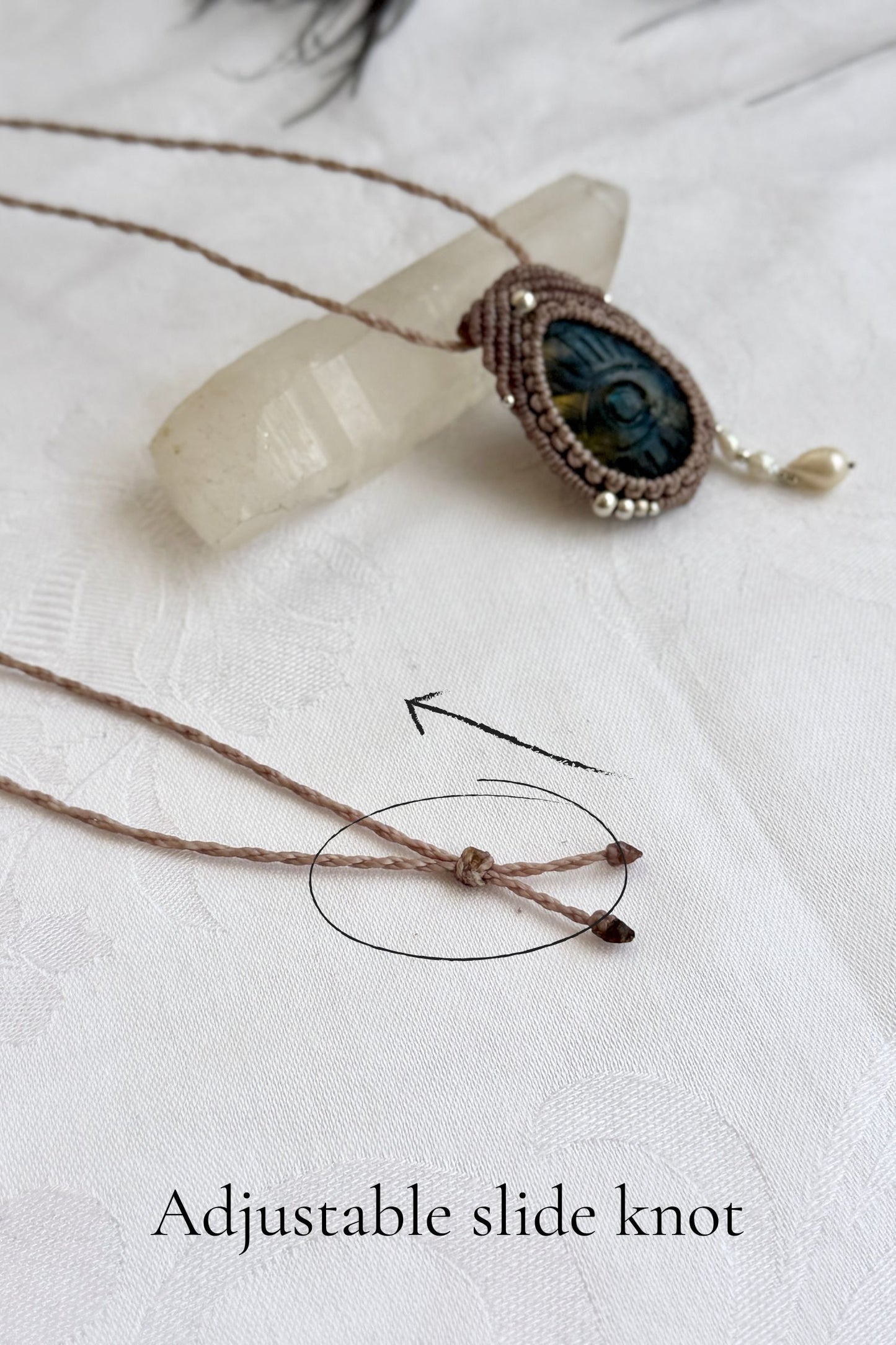 Adjustable sliding knot closure on handmade Labradorite necklace, showing versatile and comfortable fit.