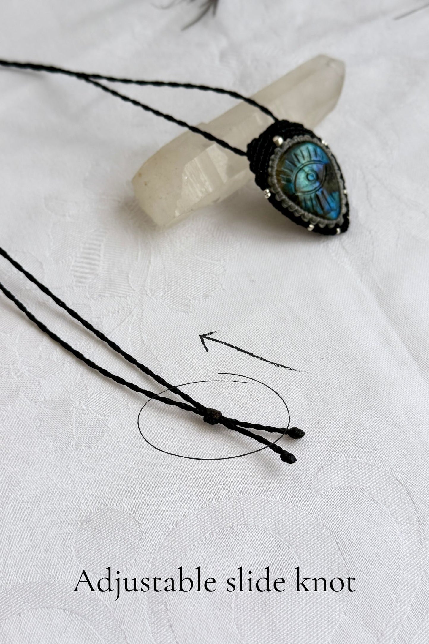 Adjustable sliding knot closure on handmade Labradorite necklace, showing versatile and comfortable fit.