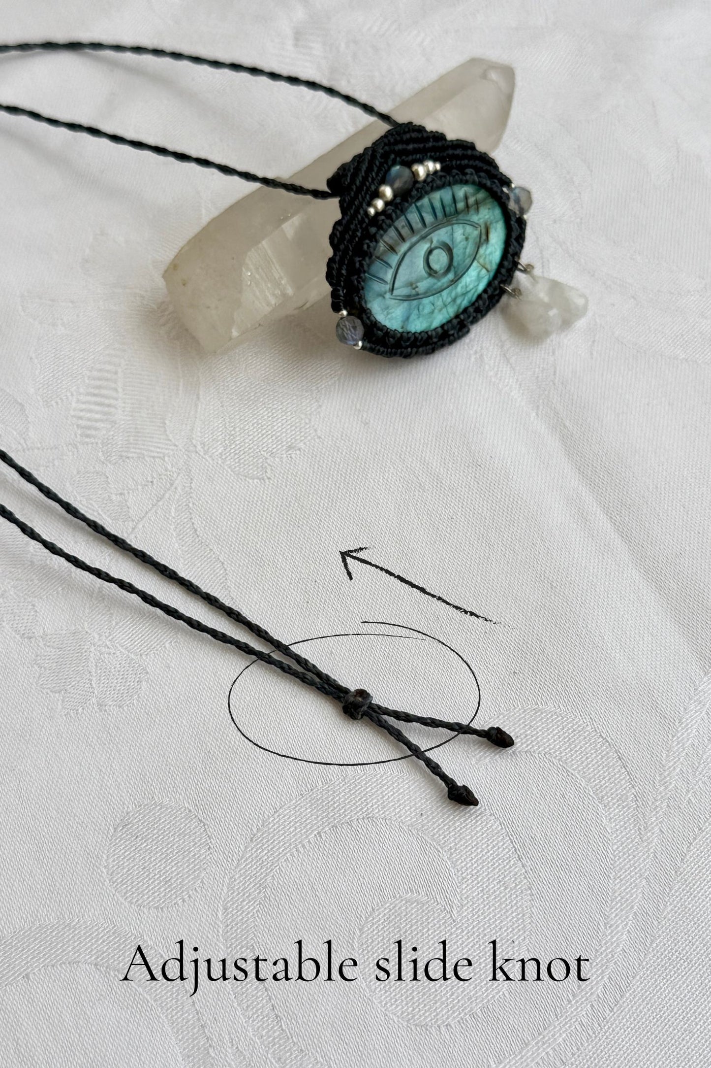 Adjustable sliding knot closure on handmade Labradorite necklace, showing versatile and comfortable fit.