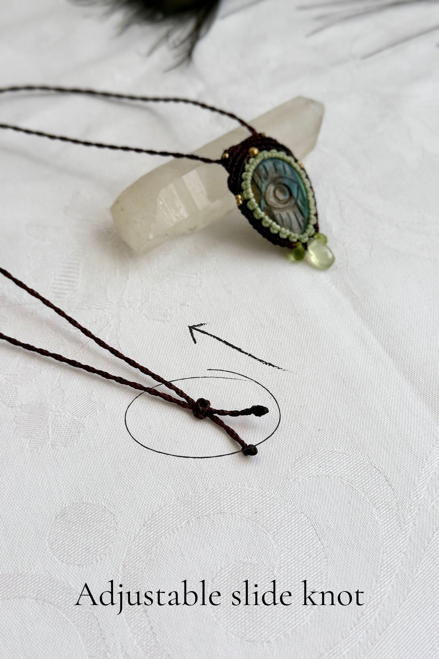 Adjustable sliding knot closure on handmade Labradorite necklace, showing versatile and comfortable fit.