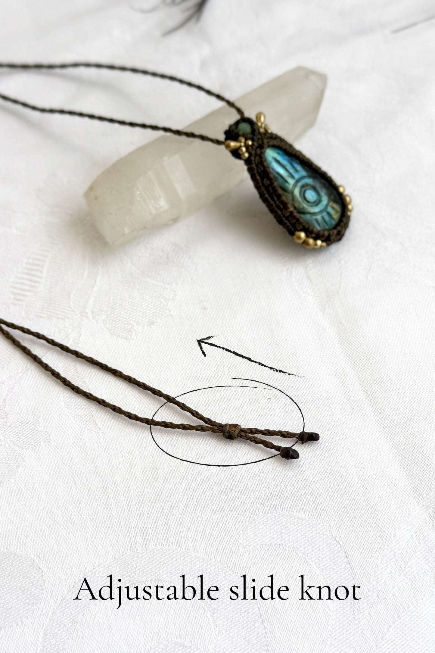 Adjustable sliding knot closure on handmade Labradorite necklace, showing versatile and comfortable fit.