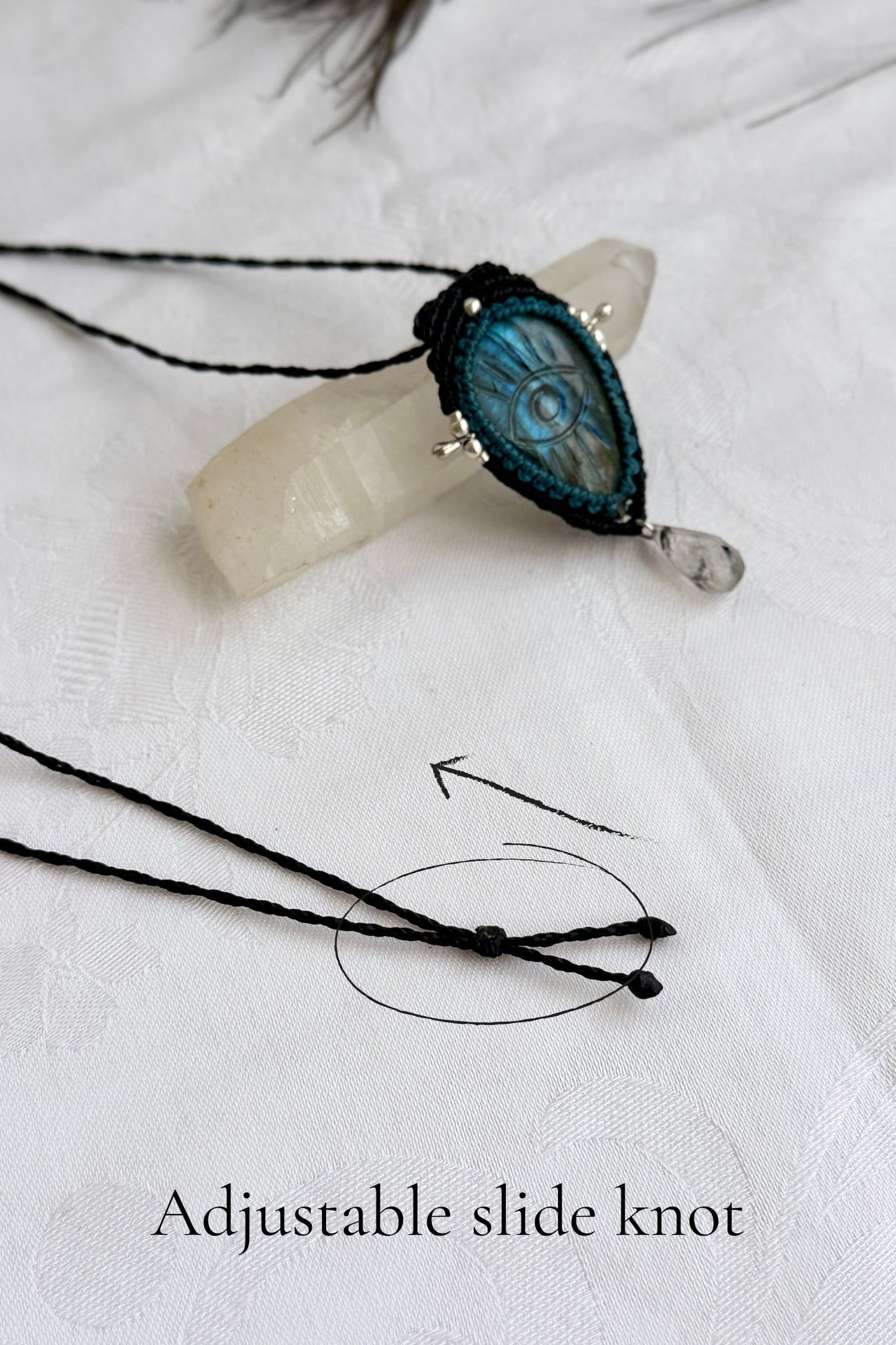 Adjustable sliding knot closure on handmade Labradorite necklace, showing versatile and comfortable fit.