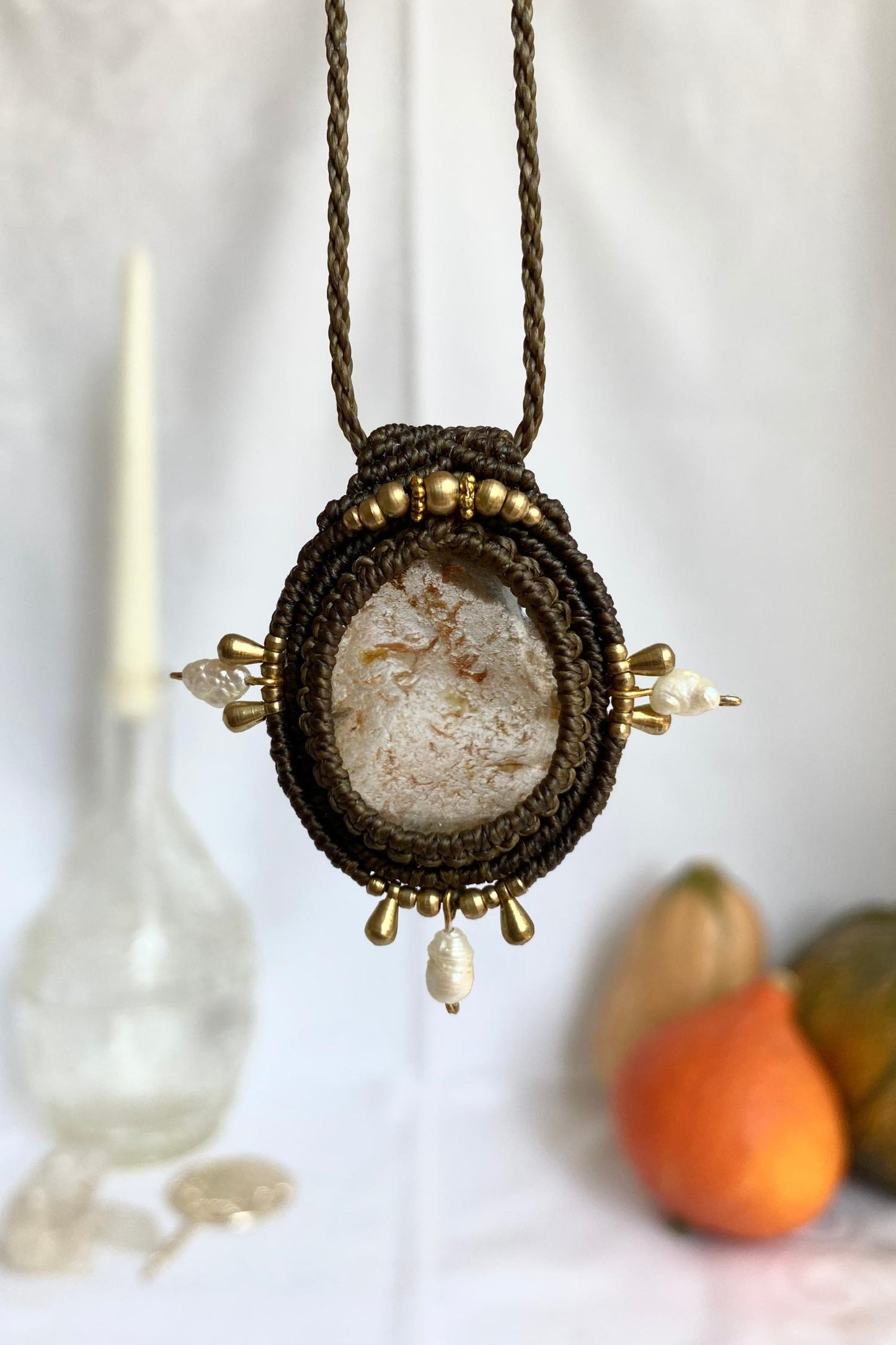 Handmade macrame necklace featuring a Lodolite gemstones and Fresh Water Pearls crafted with a unique and artistic design, offering an adjustable length for a perfect fit.