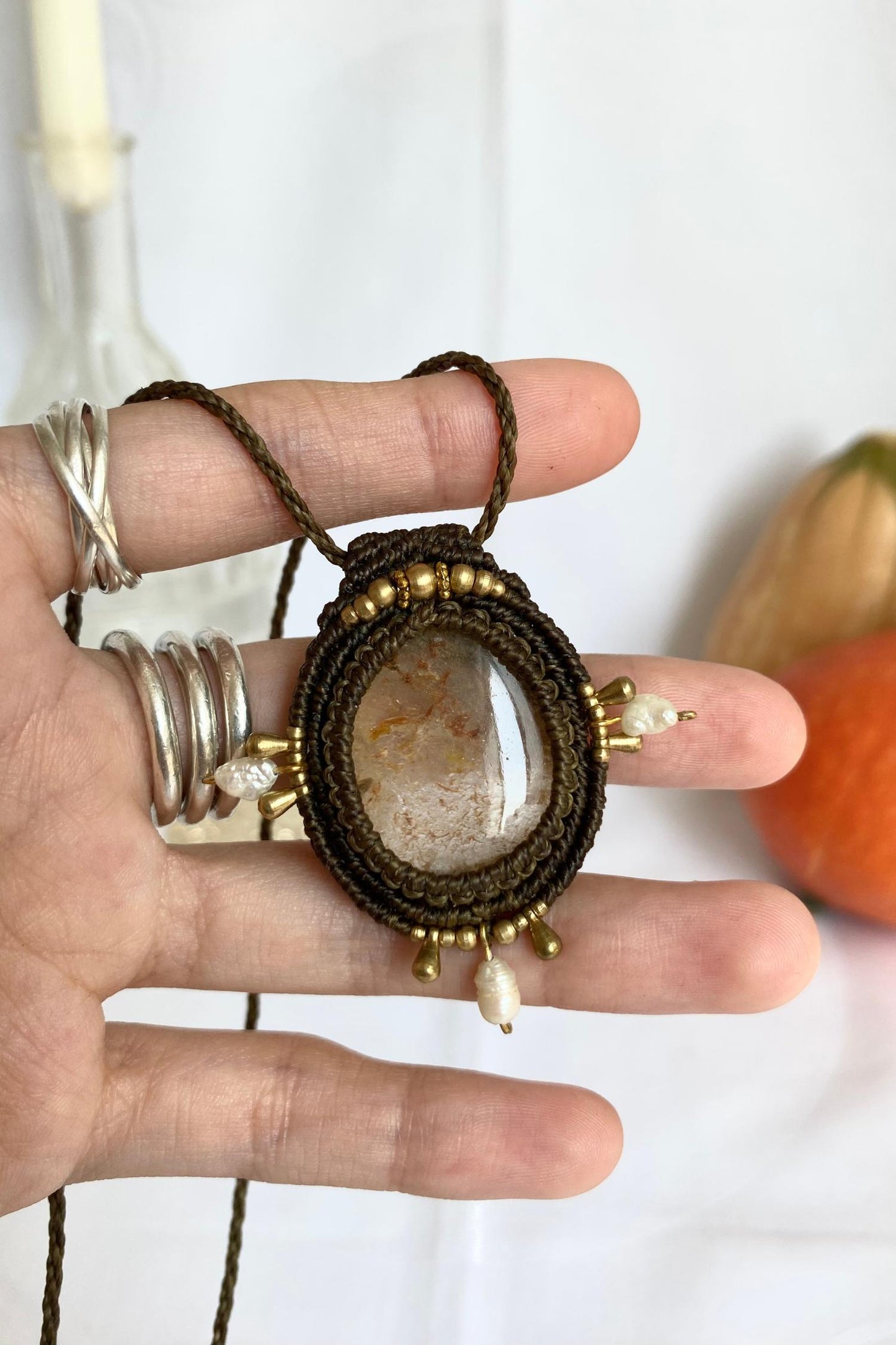 Detailed view of the handmade necklace, highlighting the raw textures of natural Lodolite gemstone and Pearls in a distinctive, statement-making design.