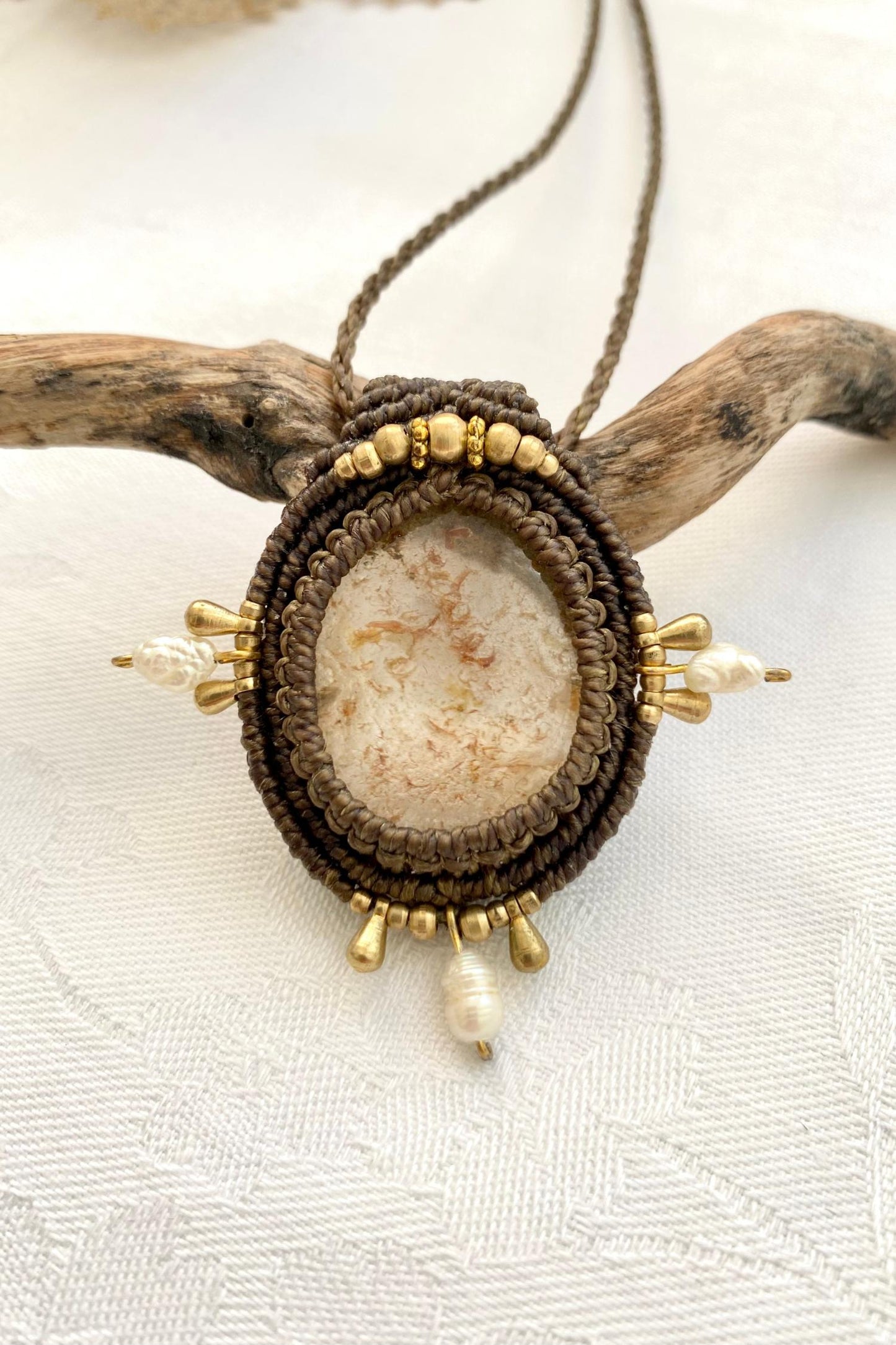 A close-up of the handmade gemstone necklace, showcasing the natural beauty of Lodolite and Fresh Water Pearls in an exclusive, one-of-a-kind design.
