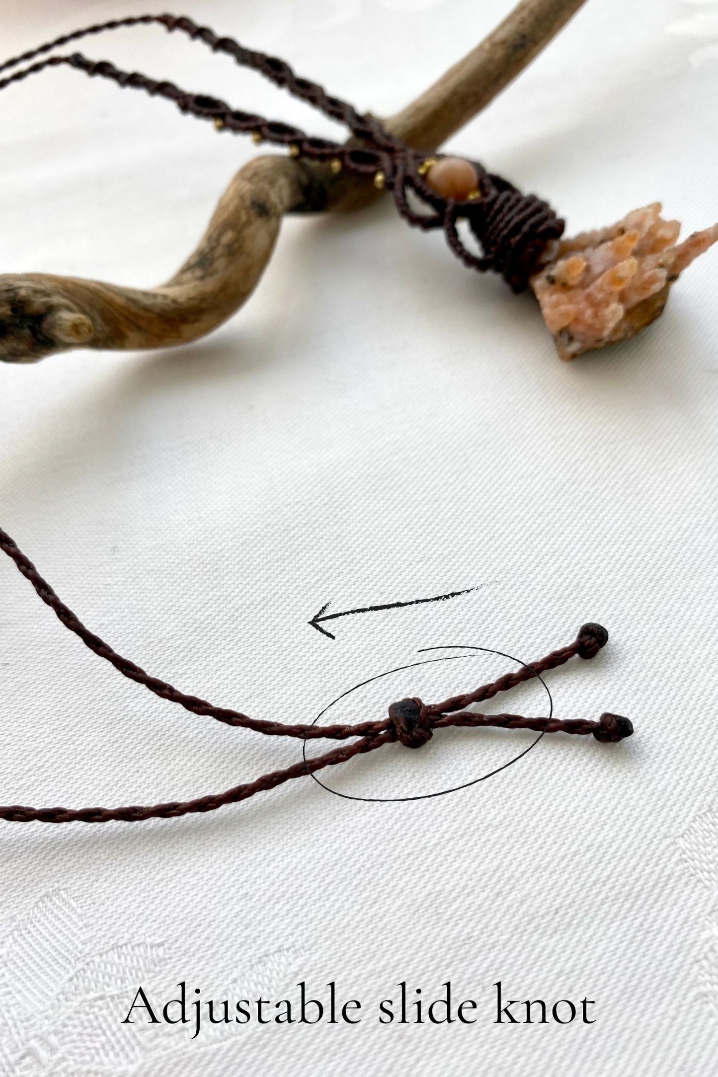 Adjustable handmade macrame necklace with a sliding knot, ensuring a customizable fit and effortless wear.