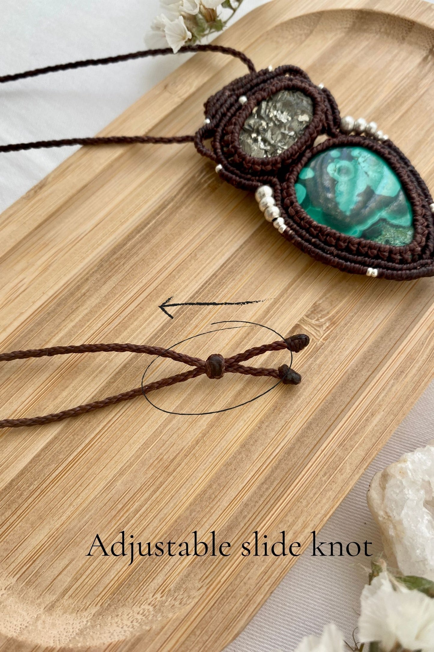 Close-up of adjustable knot detail on handmade macrame necklace, showcasing the versatility and customization for the perfect fit.