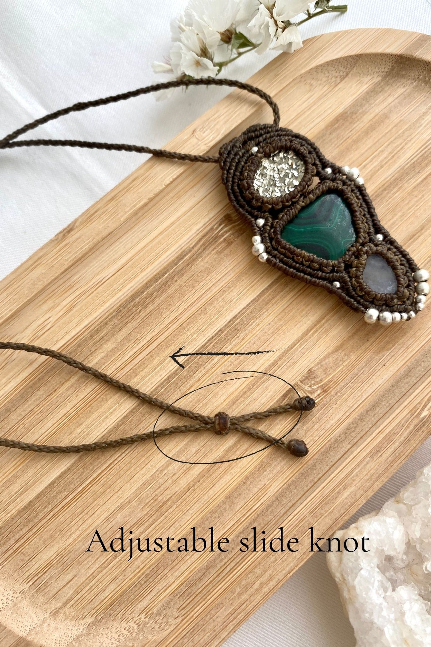 Adjustable handmade macrame necklace with a sliding knot, ensuring a customizable fit and effortless wear.
