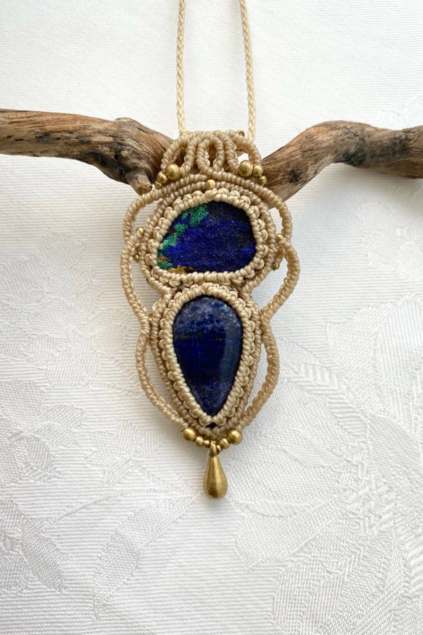 A close-up of the handmade gemstone necklace, showcasing the natural beauty of Raw Azurite and Lapis Lazuli in an exclusive, one-of-a-kind design.