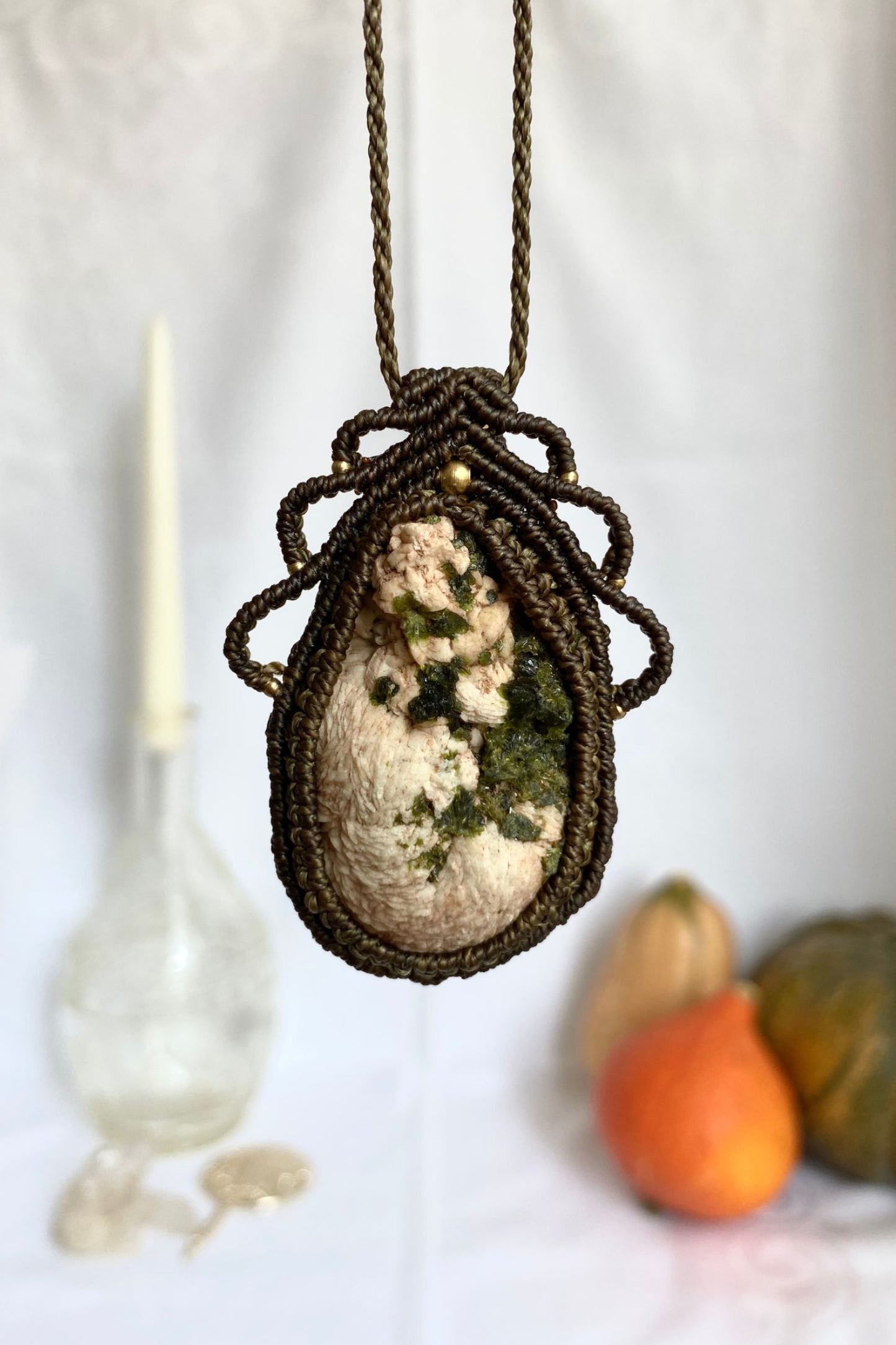 Handmade macrame necklace featuring a raw Prehnite and Epidote gemstone, crafted with a unique and artistic design, offering an adjustable length for a perfect fit.
