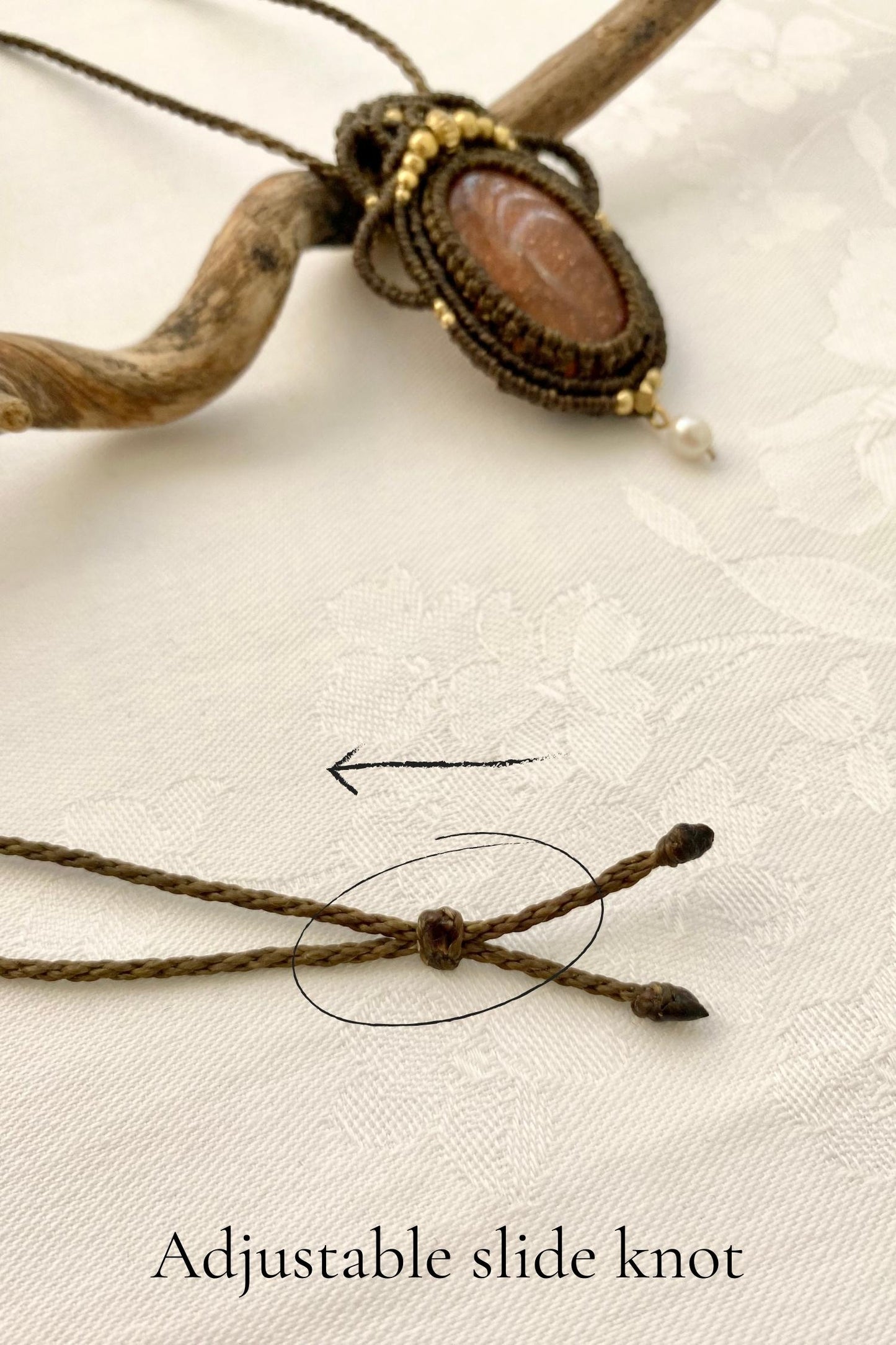 Adjustable handmade macrame necklace with a sliding knot, ensuring a customizable fit and effortless wear.