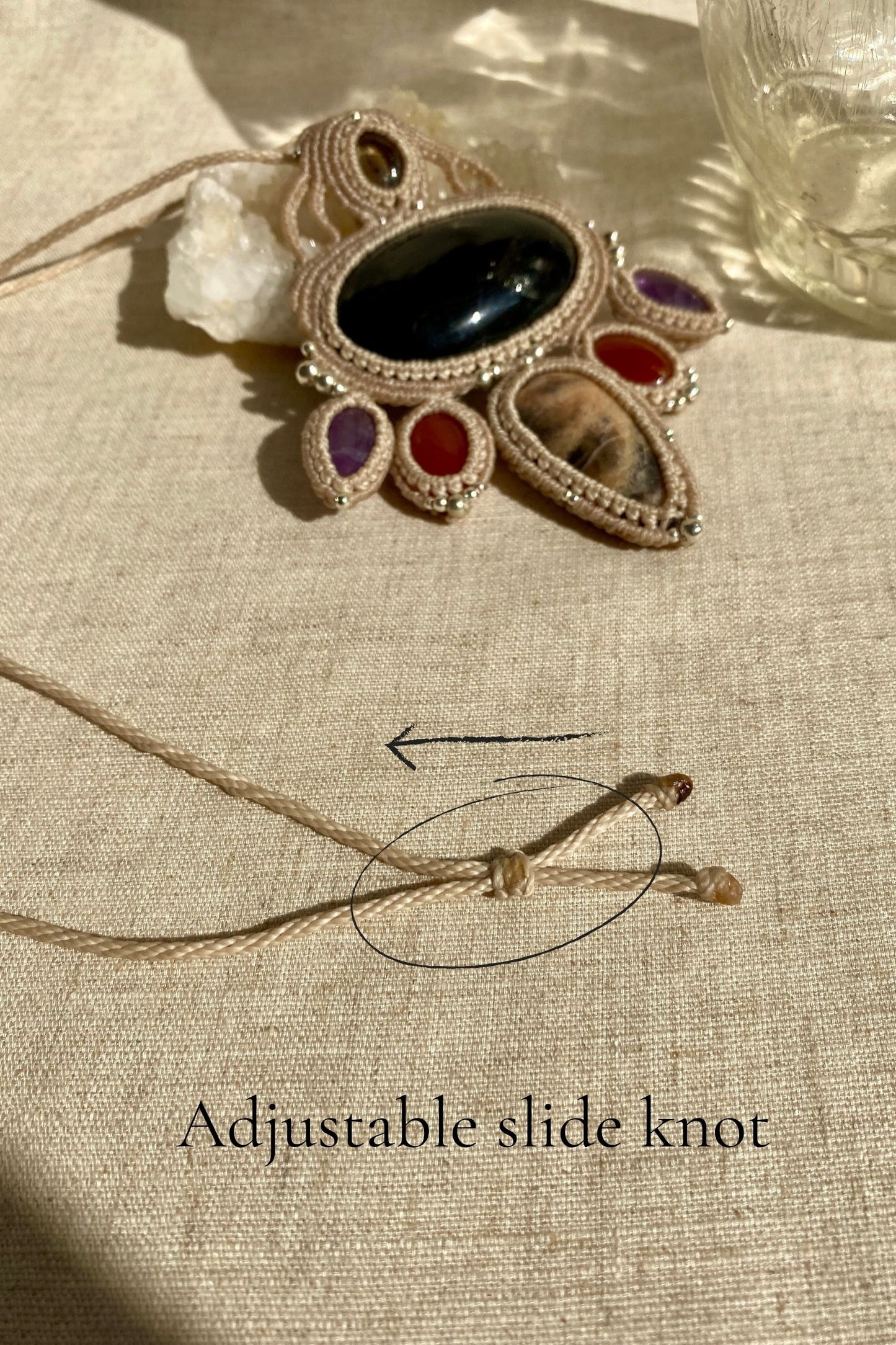 Close-up of the adjustable knot detail on handmade macrame necklace, allowing for a customizable fit while highlighting the gemstone design.