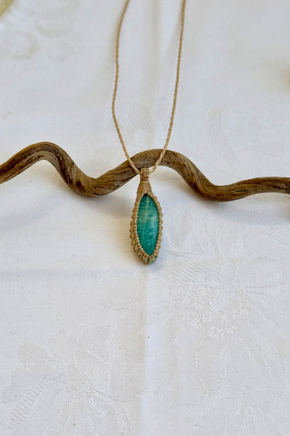 Handmade Amazonite Macrame necklace featuring a high-quality gemstone, laid flat to showcase its delicate everyday-wear design from the Essence collection.