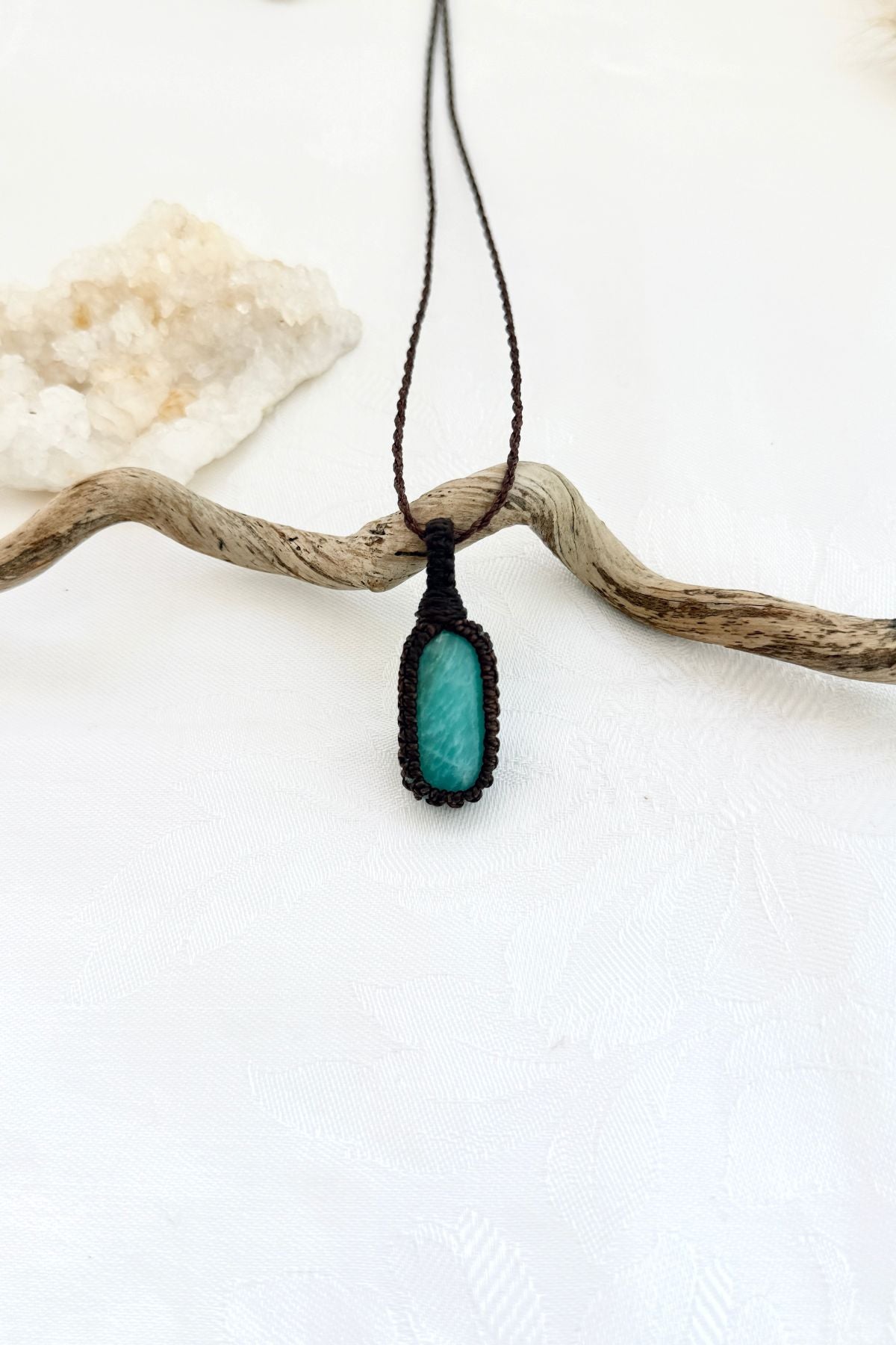 Handmade Amazonite macramé necklace, front view of natural gemstone pendant