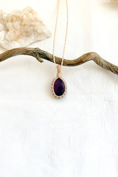 Handmade Amethyst macramé necklace, front view of natural gemstone pendant