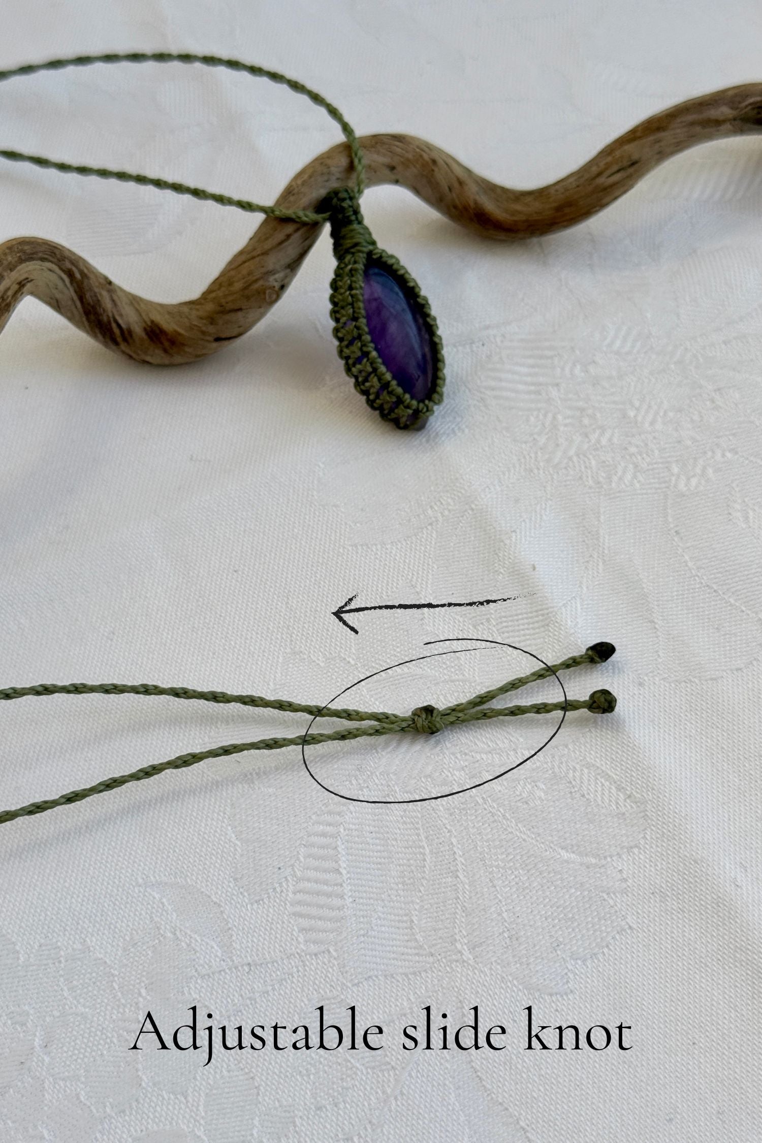 Close-up of the adjustable sliding knot on the Amethyst Macrame necklace, allowing for an easy and customizable fit for any wearer.