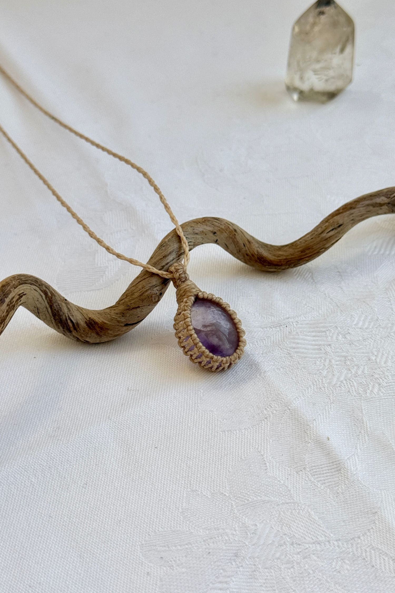 Another side angle shot of the handmade Ametrine Macrame necklace, emphasizing the elegant craftsmanship and natural gemstone colors.