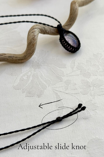 Close-up of the adjustable sliding lock on a handmade Ametrine macrame necklace, ensuring a perfect fit for all sizes.