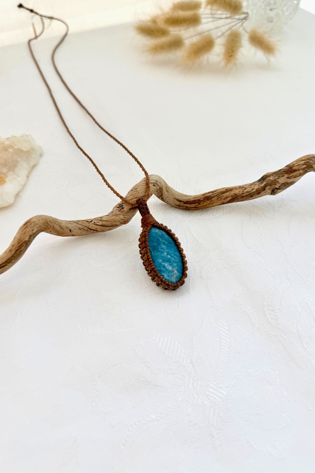 Handmade Apatite macramé necklace, side view showing the gemstone and macramé knotting