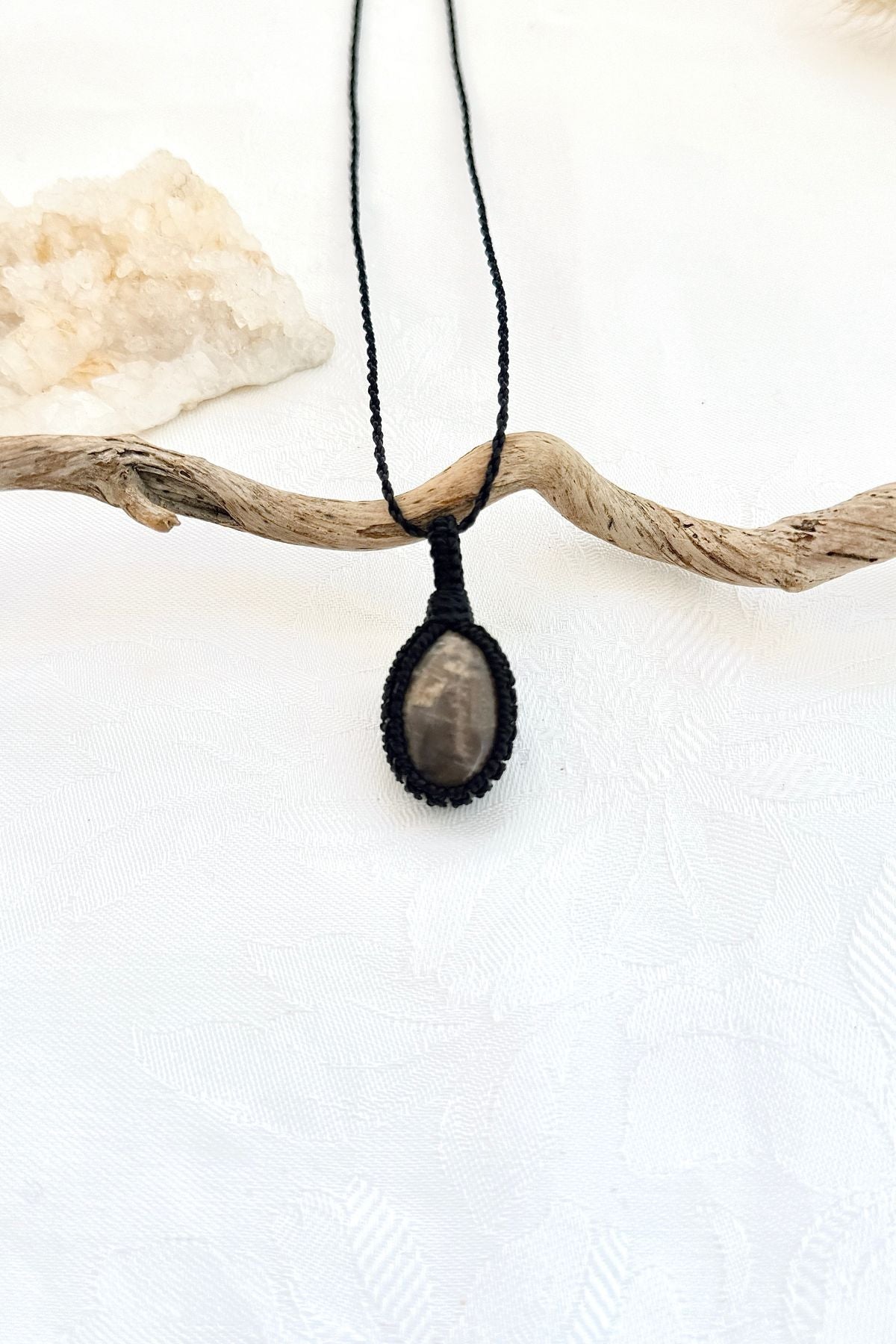 Handmade Black Moonstone macramé necklace, front view of natural gemstone pendant