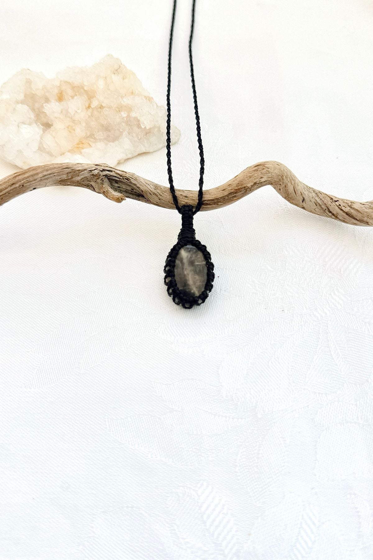 Handmade Black Moonstone macramé necklace, front view of natural gemstone pendant