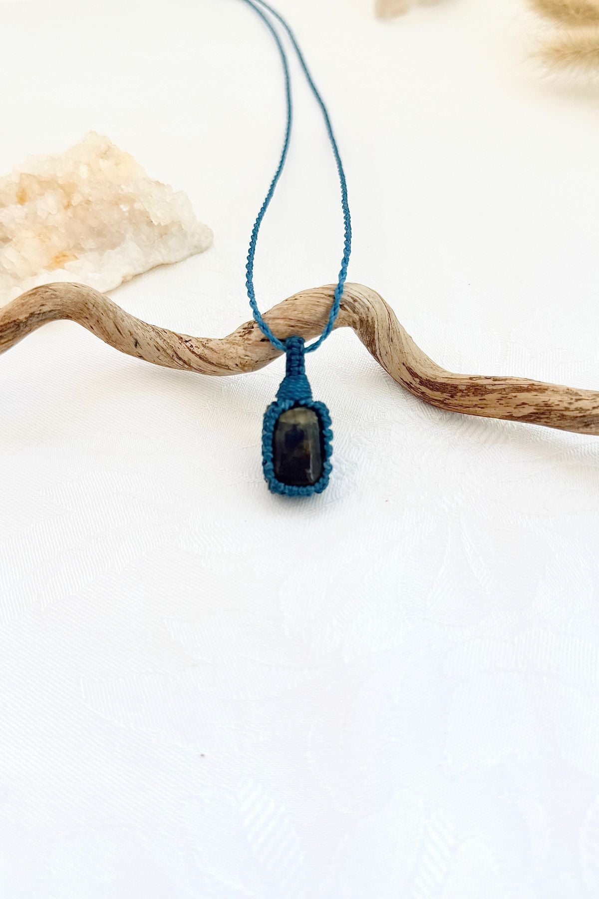 Handmade Labradorite macramé necklace, front view of natural gemstone pendant