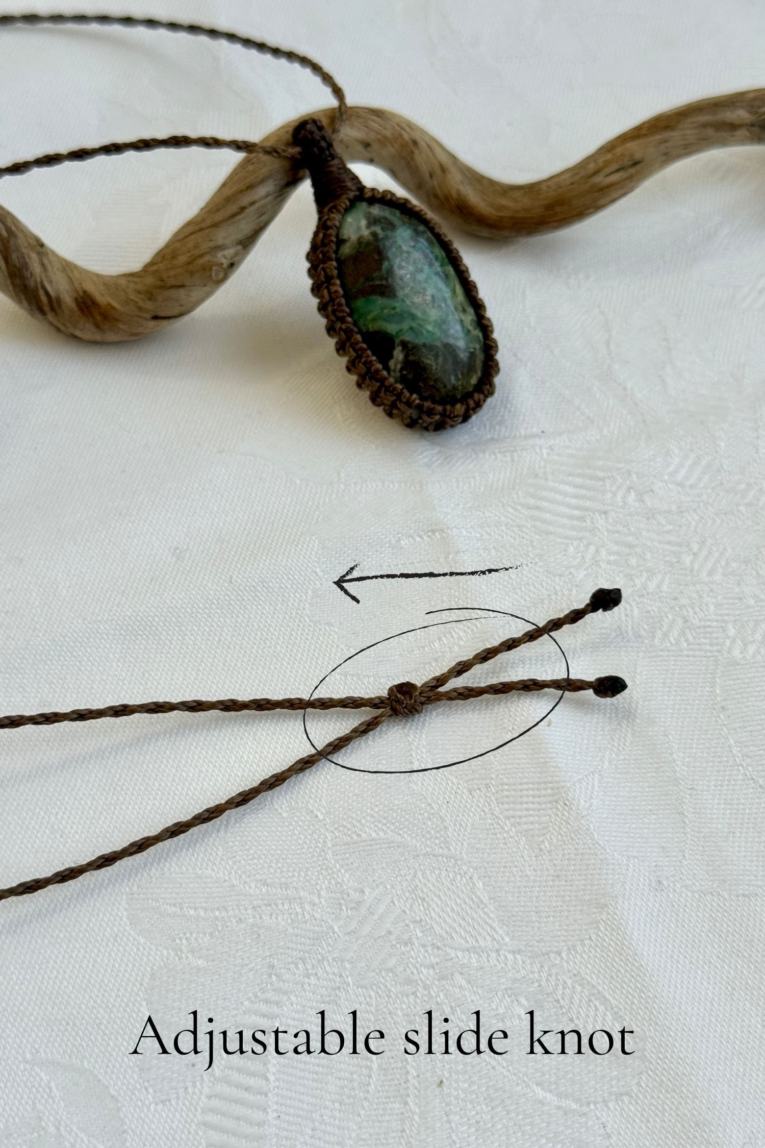 Close-up of the adjustable sliding knot on the Chrysocolla Macrame necklace, allowing for an easy and customizable fit for any wearer.