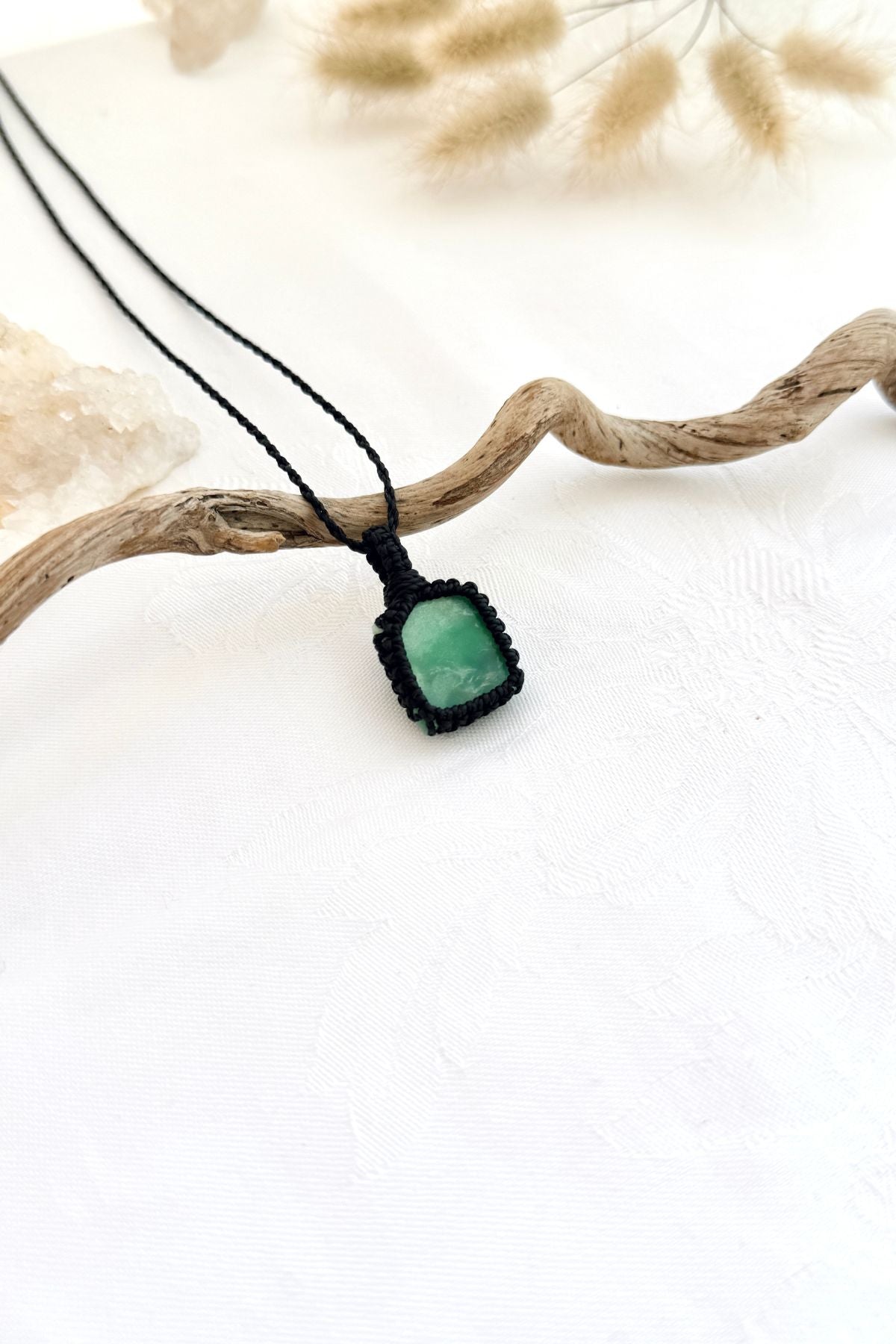 Handmade Chrysoprase macramé necklace, side view showing the gemstone and macramé knotting
