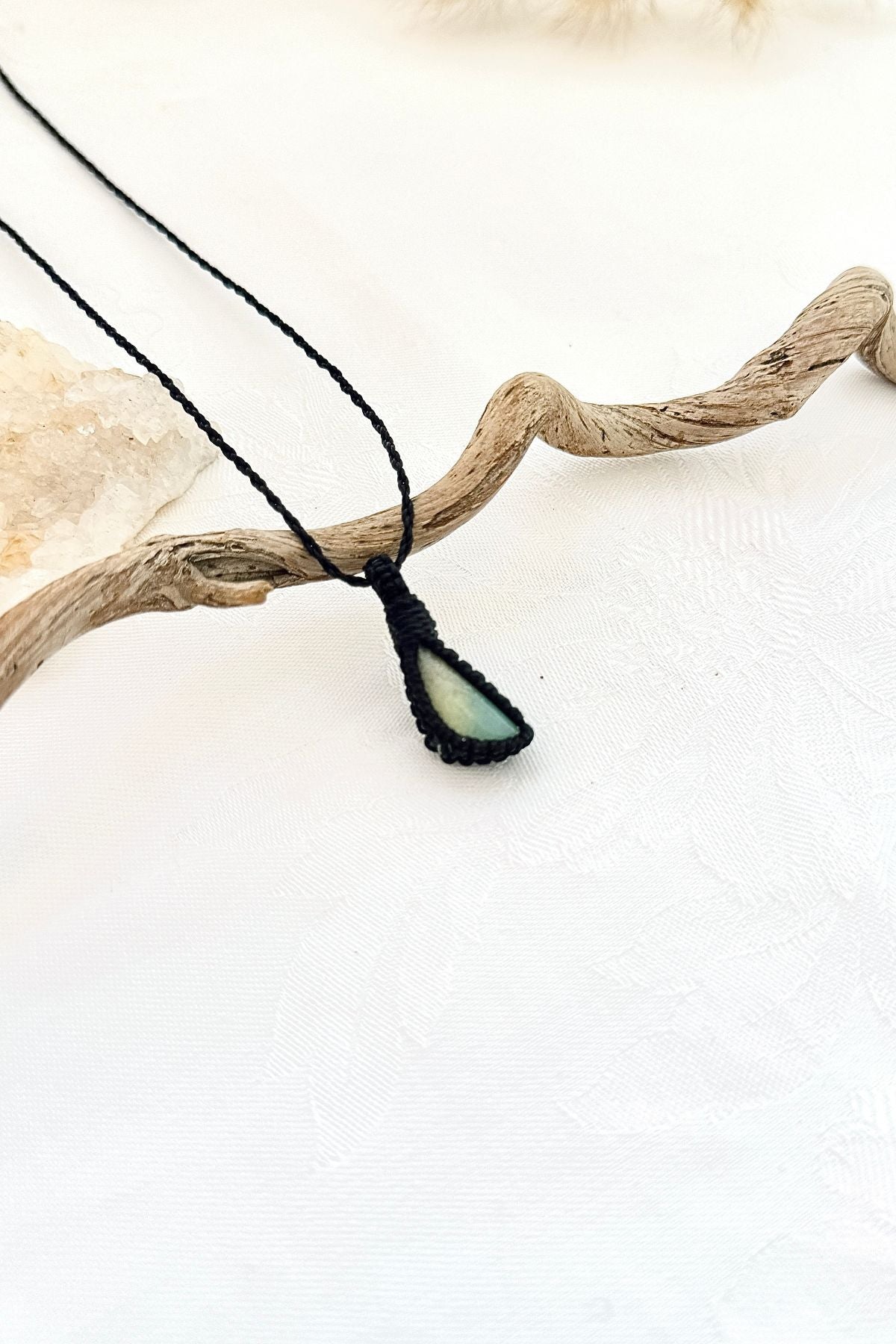 Handmade Chrysoprase macramé necklace, side view showing the gemstone and macramé knotting