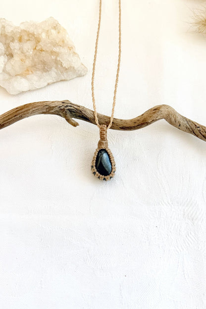 Handmade Hematite macramé necklace, front view of natural gemstone pendant