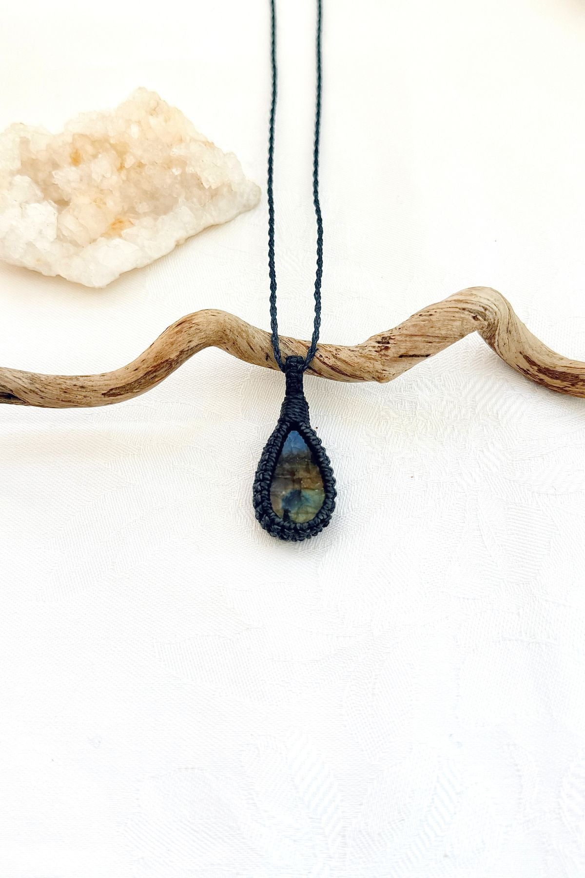 Handmade Labradorite macramé necklace, front view of natural gemstone pendant