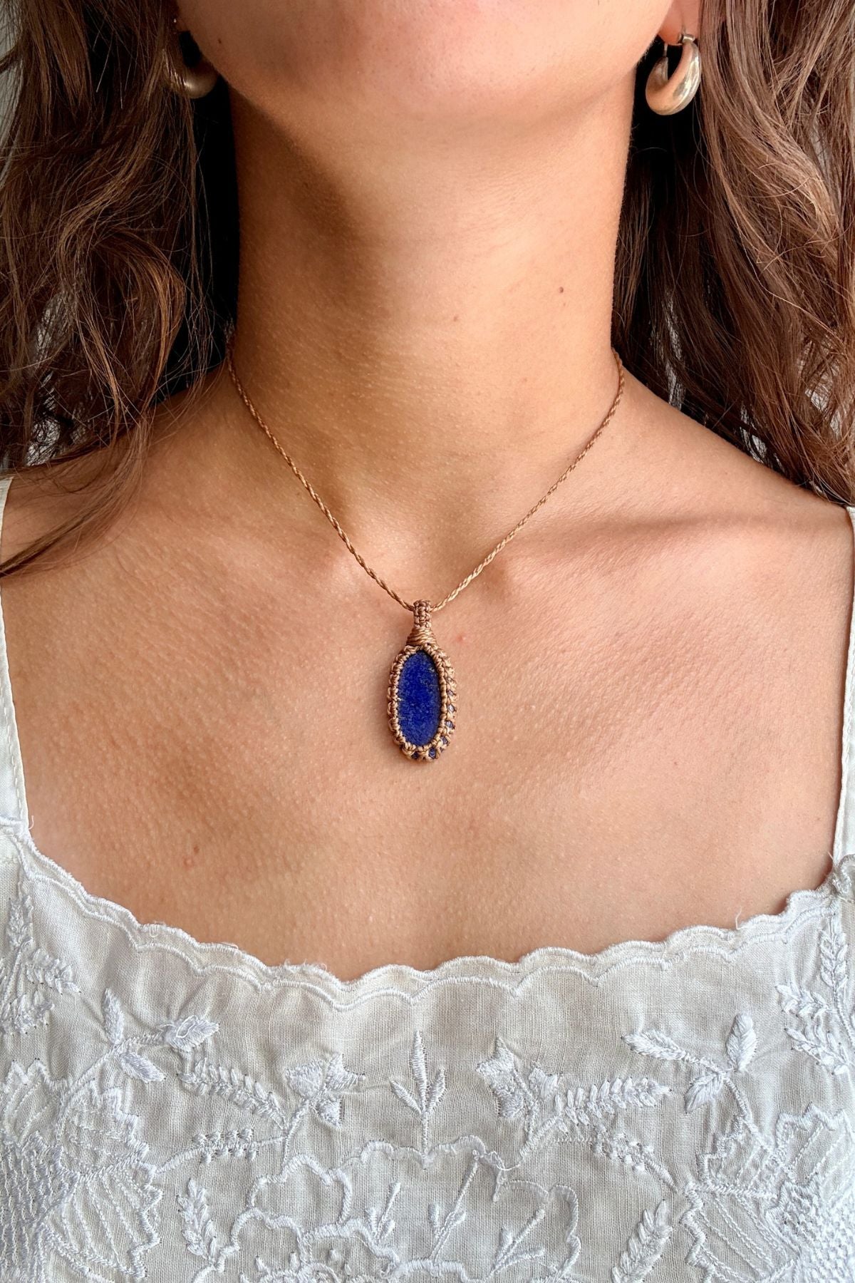 Model wearing a handmade Lapis Lazuli macramé necklace, delicate everyday jewelry