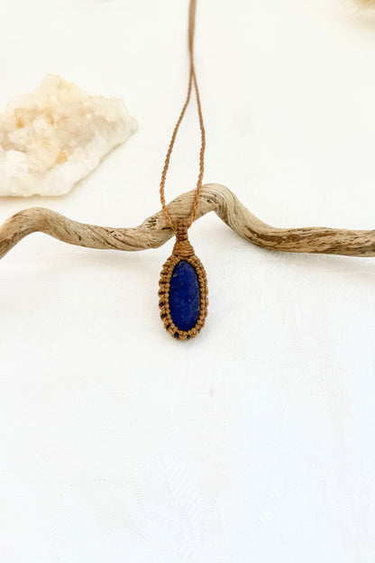 Handmade Lapis Lazuli macramé necklace, front view of natural gemstone pendant