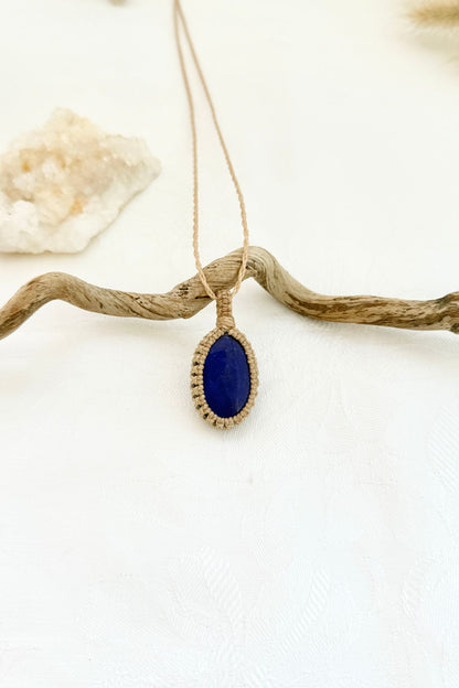 Handmade Lapis Lazuli macramé necklace, front view of natural gemstone pendant