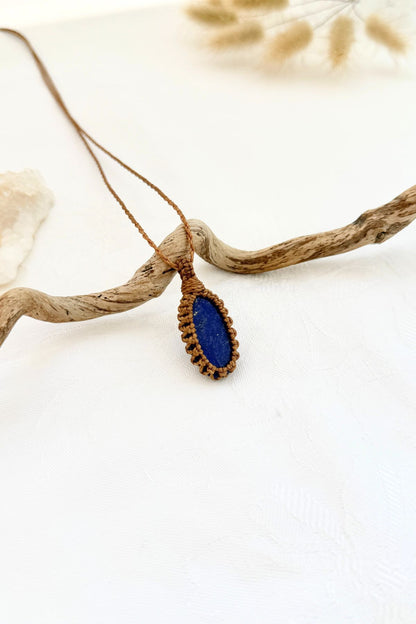 Handmade Lapis Lazuli macramé necklace, side view showing the gemstone and macramé knotting