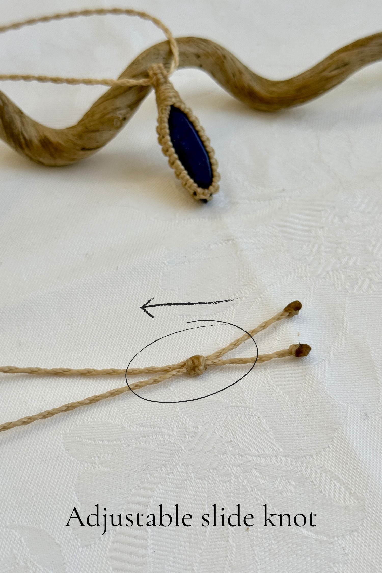 Close-up of the adjustable sliding knot on the Lapis Lazuli Macrame necklace, allowing for an easy and customizable fit for any wearer.