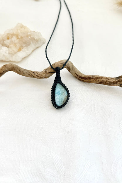 Handmade Larimar macramé necklace, front view of natural gemstone pendant