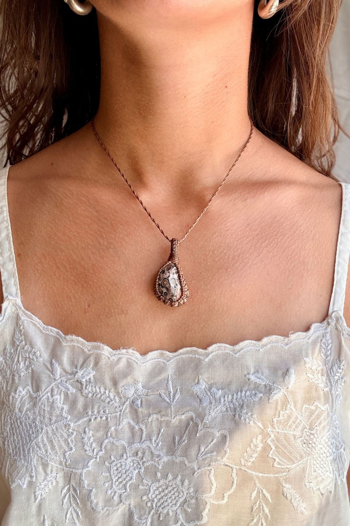 Model wearing a handmade Leopard Jasper macramé necklace, delicate everyday jewelry
